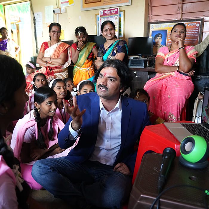 Santosh Talaghatti with women from a self-help group community program