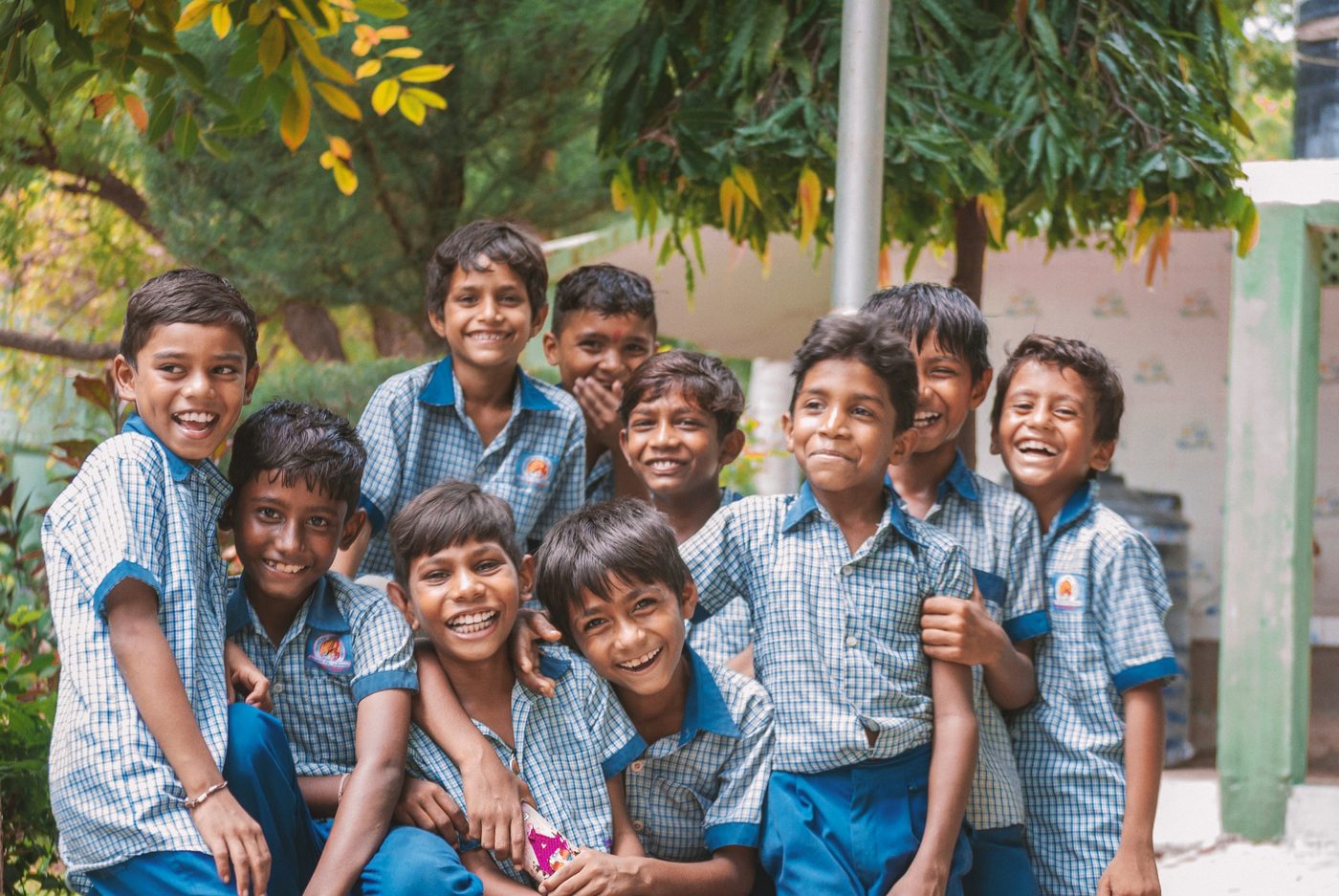 Group of happy rural schoolchildren supported by Heal The World programs